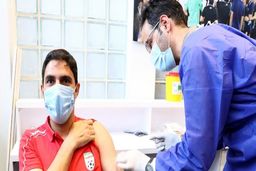 تصاویر تزریق واکسن کرونا به کادر و کاپیتان تیم ملی فوتبال